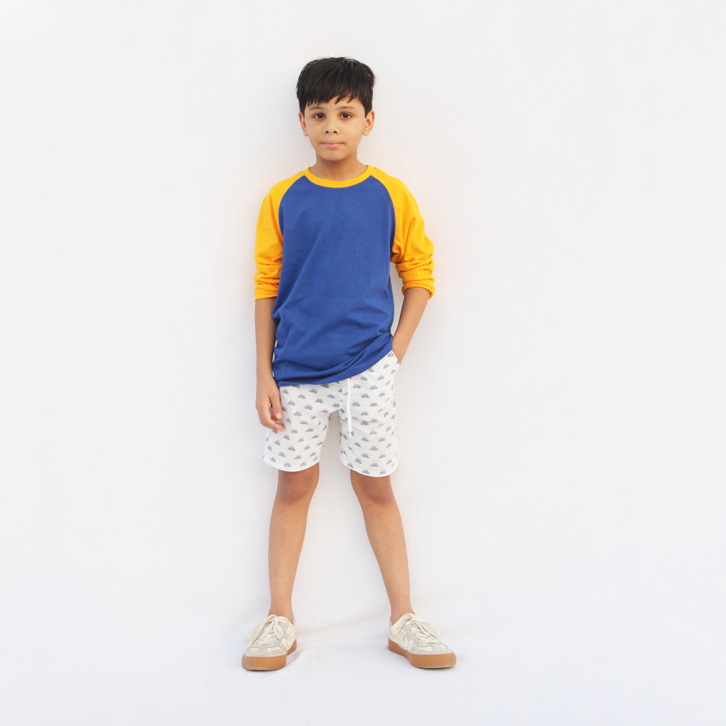 Size chart of blue yellow raglan full sleeve tshirt ages 1 to 14 years