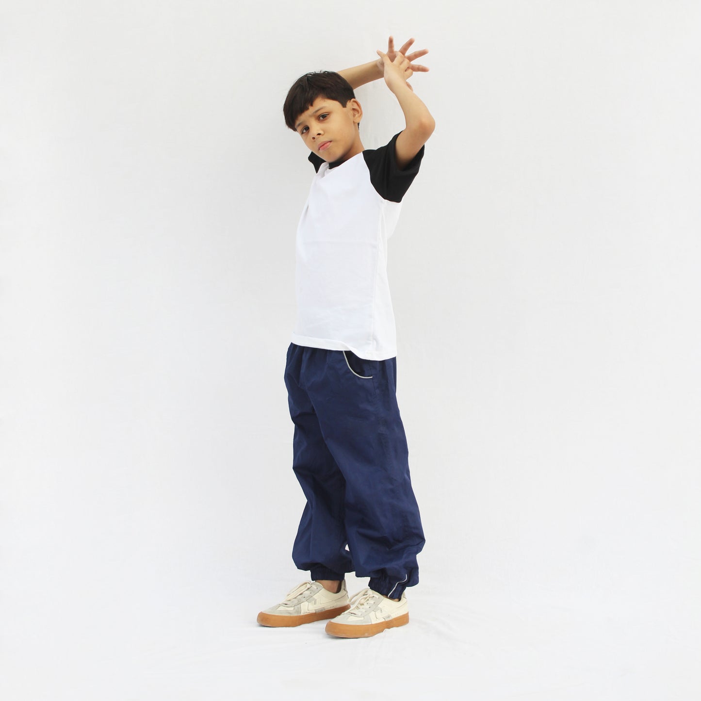 Kids black sleeve white body raglan T-shirt back design