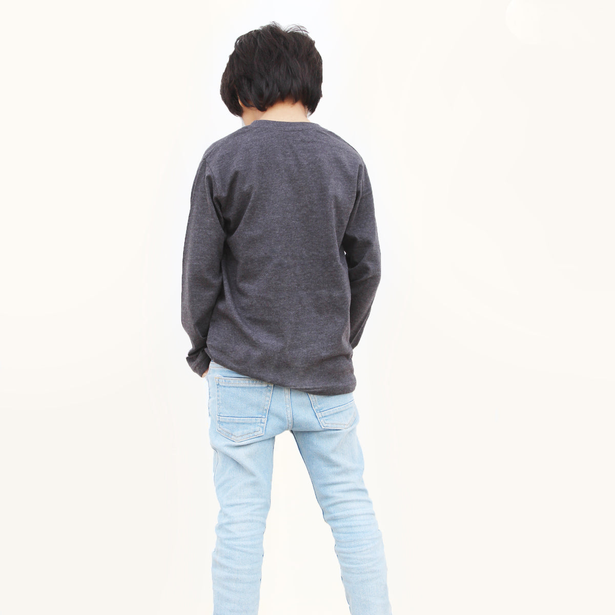 Back view of a charcoal grey full sleeve cotton jersey T-shirt for boys and girls.