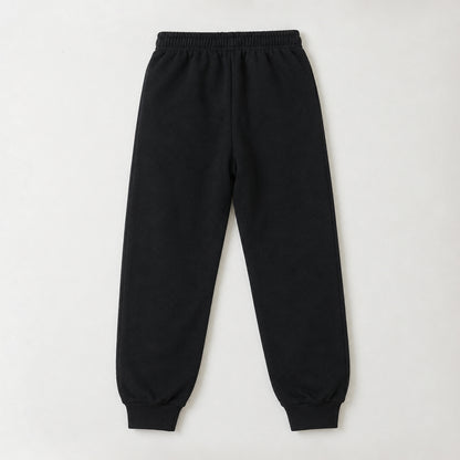 Full-length black fleece joggers for kids with grey contrast panels, a comfortable drawstring waist, and ribbed ankle cuffs.
