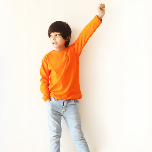 Orange long sleeve kids T-shirt for boys and girls, versatile children's casual clothing for everyday wear.